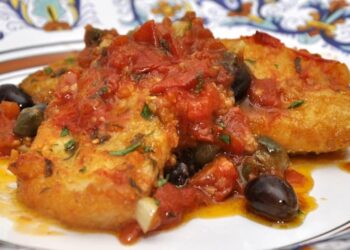 Baccalà alla ghiotta: la ricetta siciliana da preparare alla Vigilia